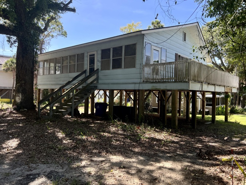 ** Small Elevated Cottage Selling AS-IS Condition ** On Huge - Beach Home for sale in Folly Beach, South Carolina on Beachhouse.com