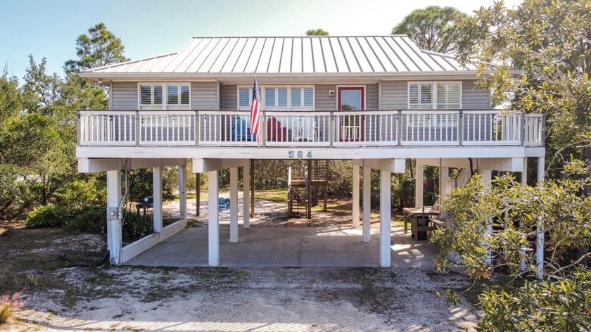 Delightful beach bungalow with everything you need for a simple - Beach Home for sale in St. George Island, Florida on Beachhouse.com