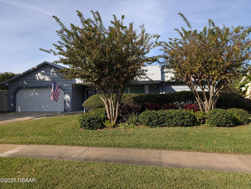 Stunning 5-bedroom, 2-bath pool home with a fenced yard, ideally - Beach Home for sale in Port Orange, Florida on Beachhouse.com
