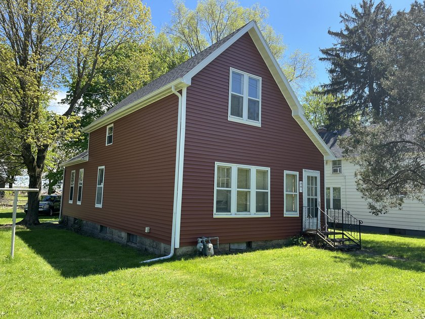 Roof, exterior vinyl siding, soffits/facia, storm windows and - Beach Home for sale in Benton Harbor, Michigan on Beachhouse.com