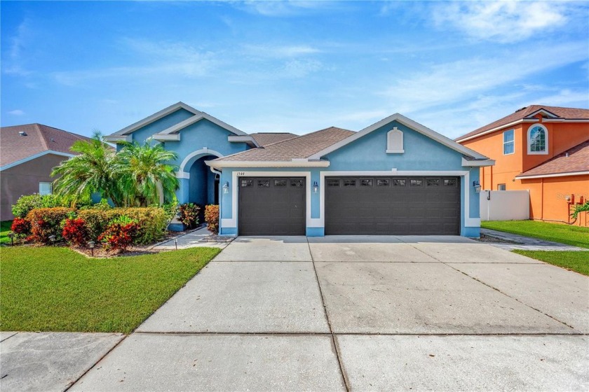 This spacious 4-bedroom, 3-bathroom home is a perfect blend of - Beach Home for sale in Ruskin, Florida on Beachhouse.com