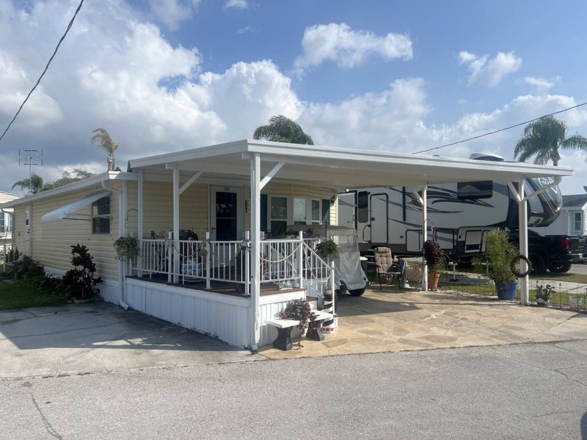 This Lovely 2 Bedroom, 1 Bath Partially FURNISHED Home is in - Beach Home for sale in Holiday, Florida on Beachhouse.com