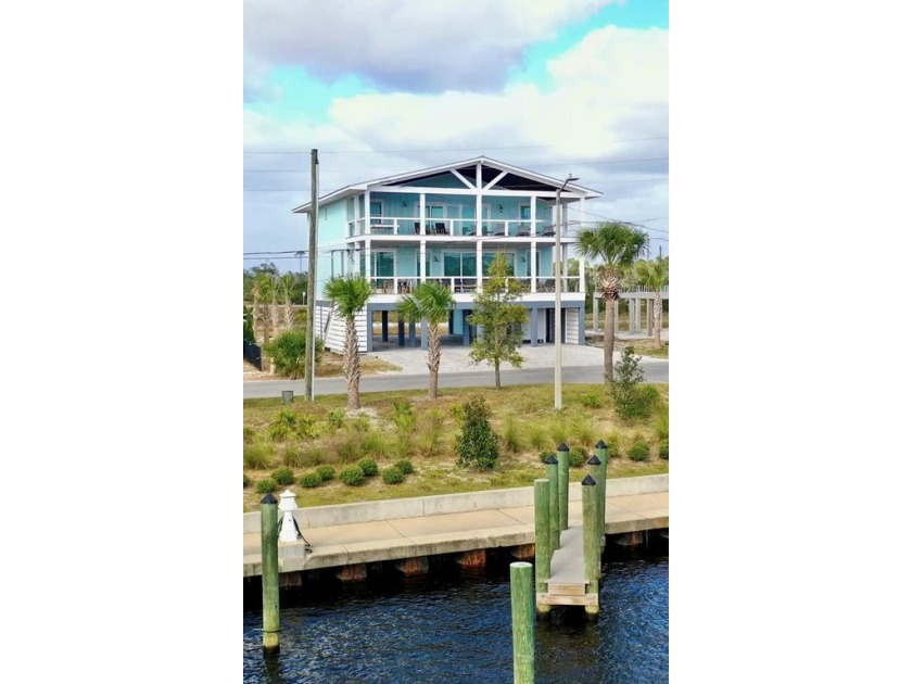 WOW! That's what you'll say upon touring this gorgeous 7 bedroom - Beach Home for sale in Mexico Beach, Florida on Beachhouse.com