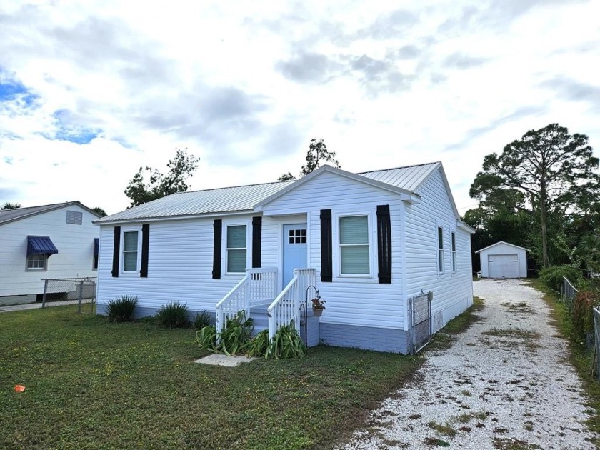 Located just a short stroll from St. Joe Bay, this delightful - Beach Home for sale in Port St Joe, Florida on Beachhouse.com