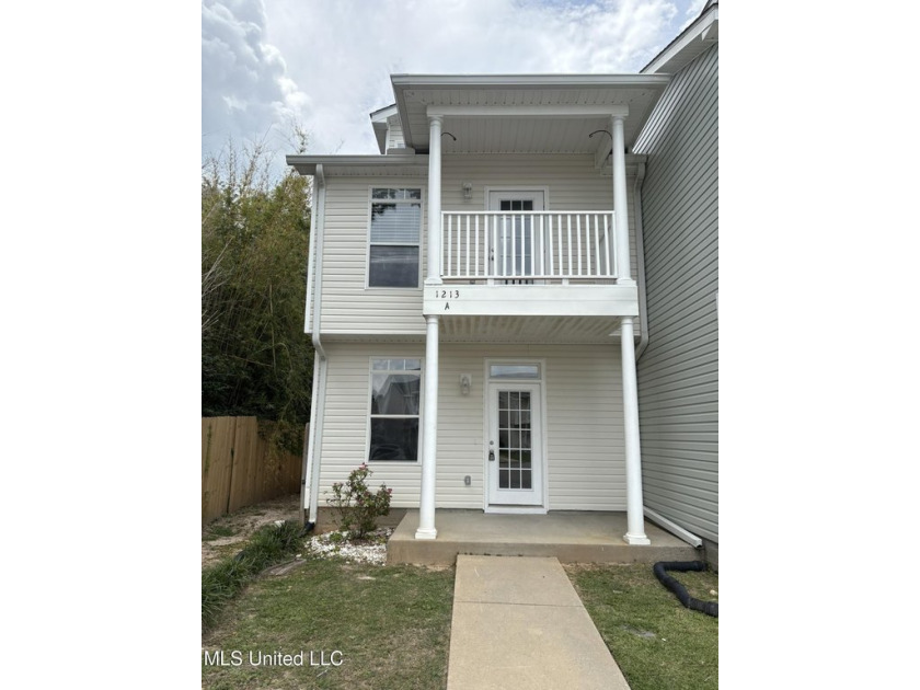 Just one block from the beach, this beautifully updated - Beach Townhome/Townhouse for sale in Gulfport, Mississippi on Beachhouse.com