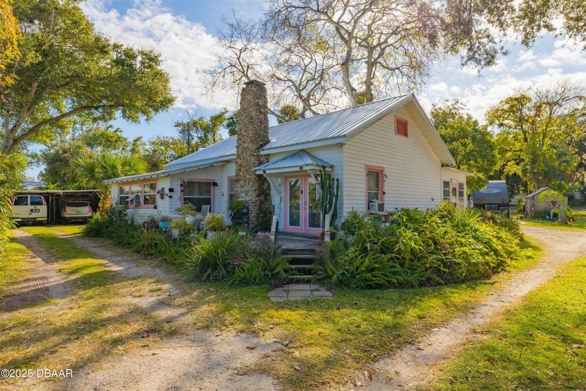 This income-producing property sits on an unheard-of 3/4-acre - Beach Home for sale in Holly Hill, Florida on Beachhouse.com