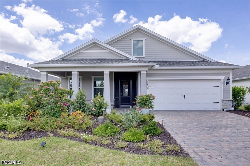 STUNNING LAKEFRONT RETREAT - ZERO CORNER SLIDERS - DESIGNER - Beach Home for sale in Punta Gorda, Florida on Beachhouse.com