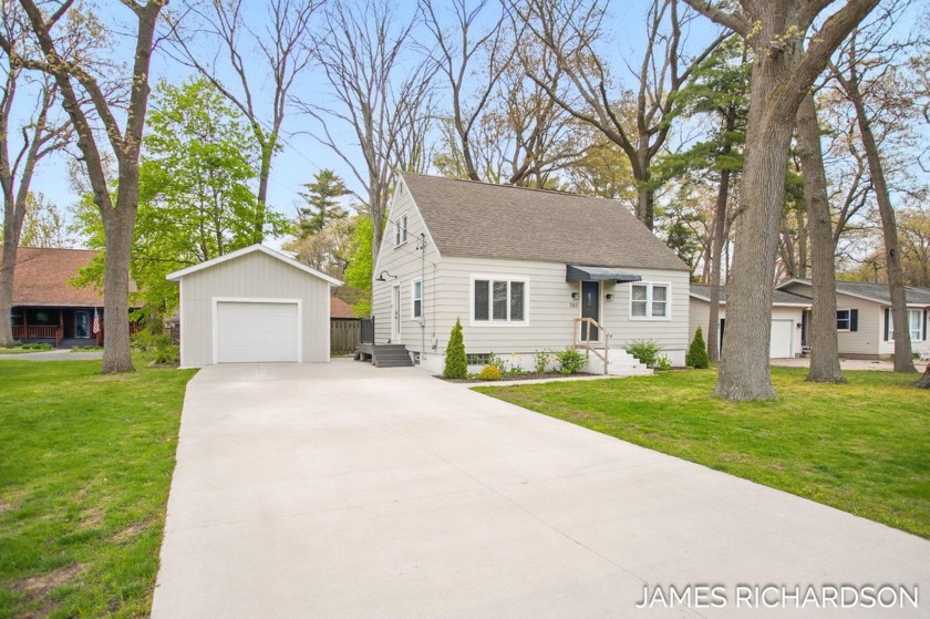 Charming Updated Home in the Village of Spring Lake! This - Beach Home for sale in Spring Lake, Michigan on Beachhouse.com