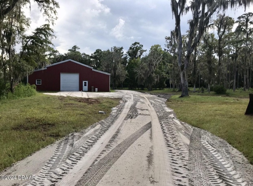 This 5 acre, private property with access off Bolton Road aligns - Beach Lot for sale in New Smyrna Beach, Florida on Beachhouse.com