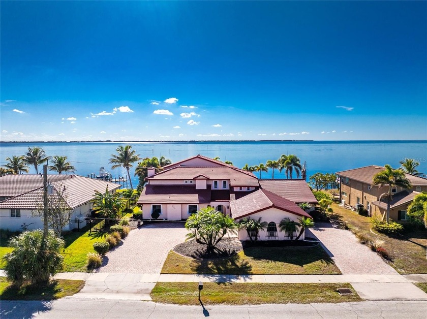Unmatched harbor views, endless potential, and a true boater's - Beach Home for sale in Port Charlotte, Florida on Beachhouse.com
