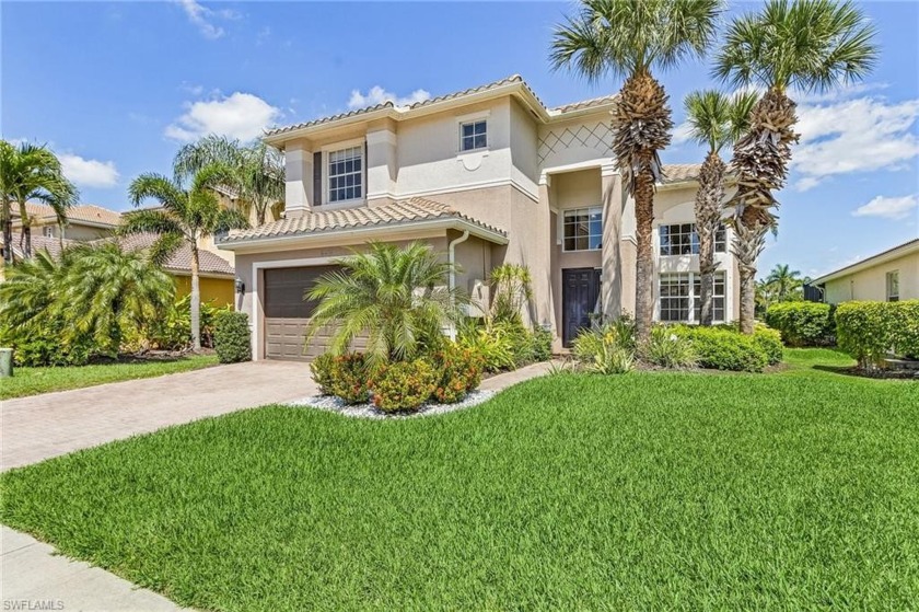 Stunning, spacious, lake-view home in Marbella Lakes featuring 4 - Beach Home for sale in Naples, Florida on Beachhouse.com