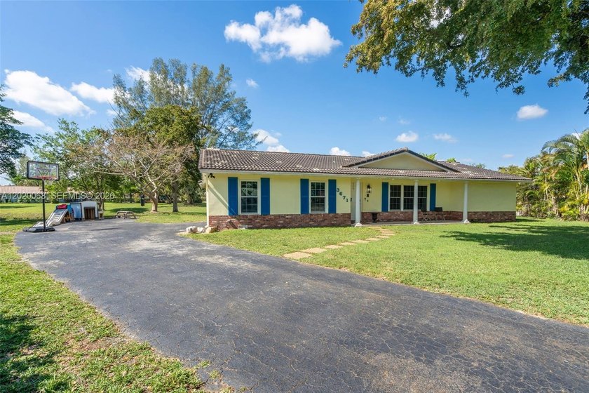 Tucked away on a quiet cul-de-sac in the highly desirable - Beach Home for sale in Coral Springs, Florida on Beachhouse.com