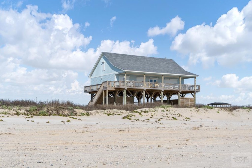 Spectacular oceanfront home with stunning views! Walls of - Beach Home for sale in Gilchrist, Texas on Beachhouse.com