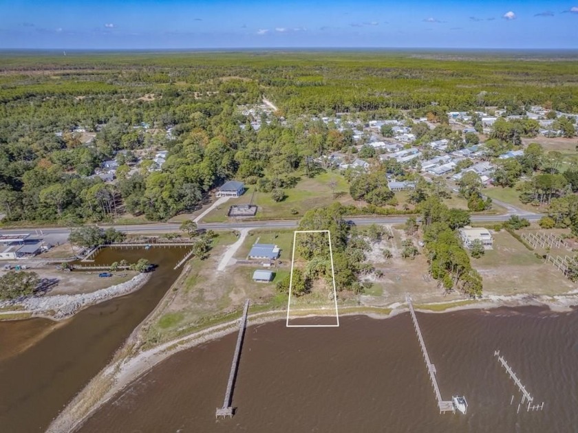 Prime waterfront lot for sale on the south side of Highway 98 - Beach Lot for sale in Lanark Village, Florida on Beachhouse.com