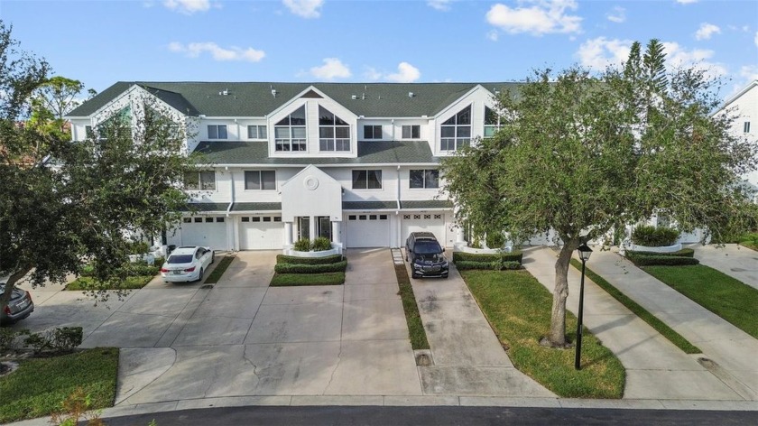 Welcome to this stunning Key West-style townhome in the - Beach Townhome/Townhouse for sale in Seminole, Florida on Beachhouse.com