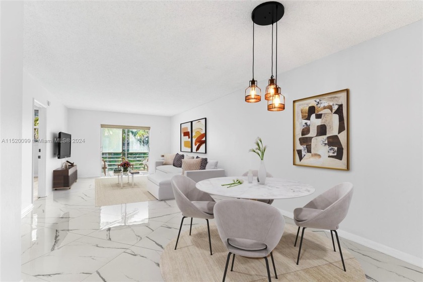 Beautiful new grey/white large tile floors in the living areas - Beach Condo for sale in Pompano Beach, Florida on Beachhouse.com