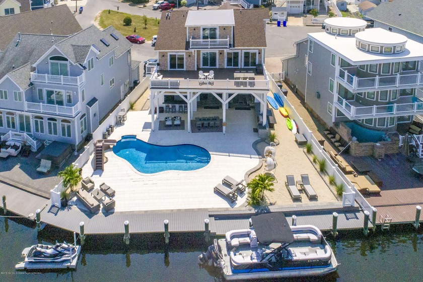 THE ULTIMATE IN WATERFRONT LIVING! Built in 2017, professionally - Beach Home for sale in Brick, New Jersey on Beachhouse.com