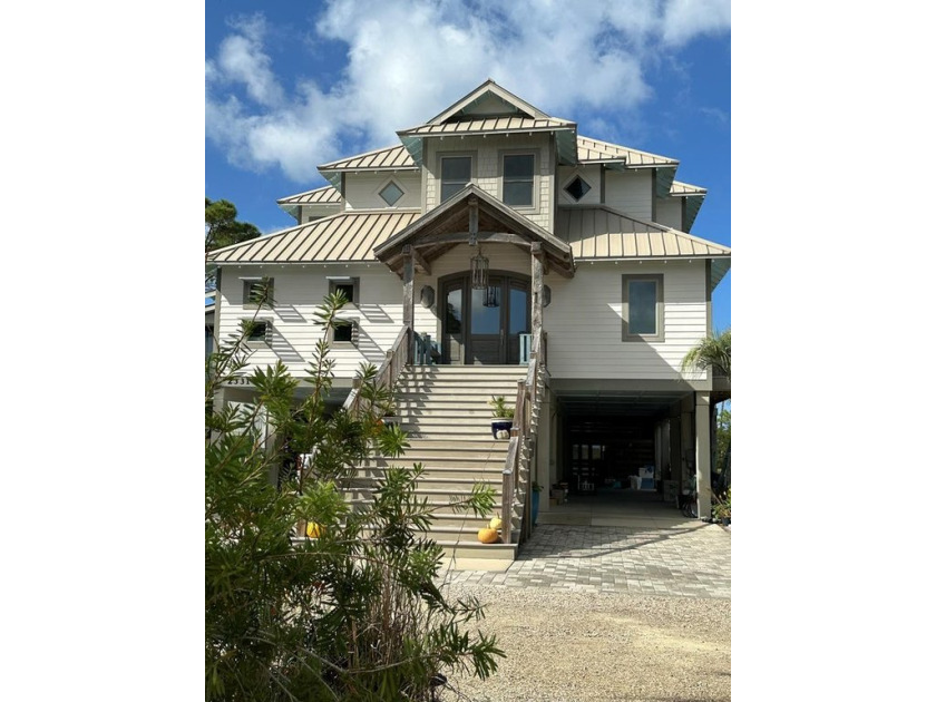 Nestled on 3.5 acres along the coastline of St. Joe Bay, this - Beach Home for sale in Port St Joe, Florida on Beachhouse.com