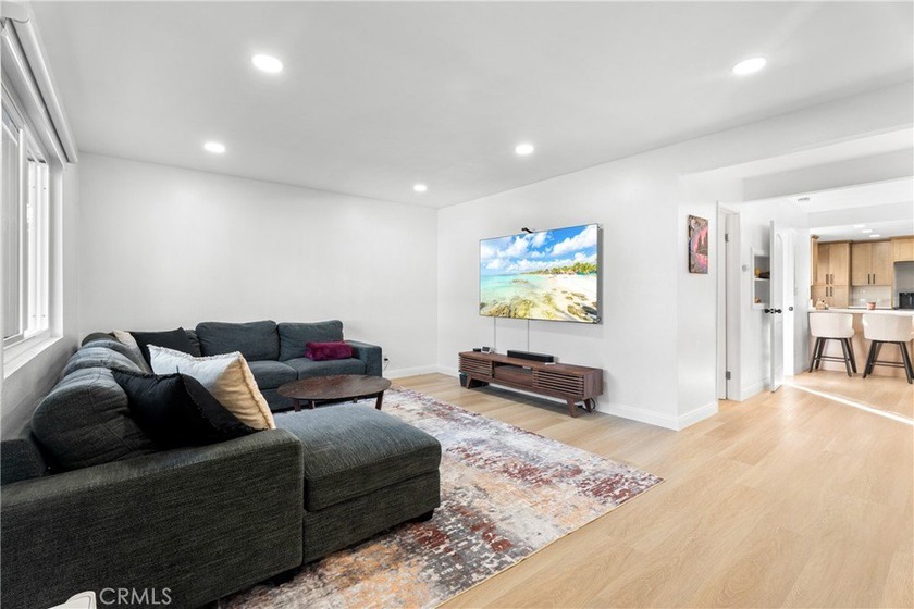 Walt to the beach! Gorgeous with a MAIN floor bedroom. Nestled - Beach Townhome/Townhouse for sale in Huntington Beach, California on Beachhouse.com