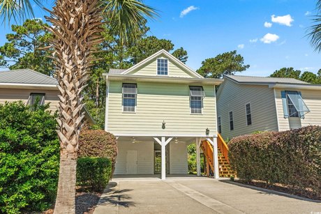 Charming Raised Beach House in Pawleys Island, SC! Nestled in - Beach Home for sale in Pawleys Island, South Carolina on Beachhouse.com