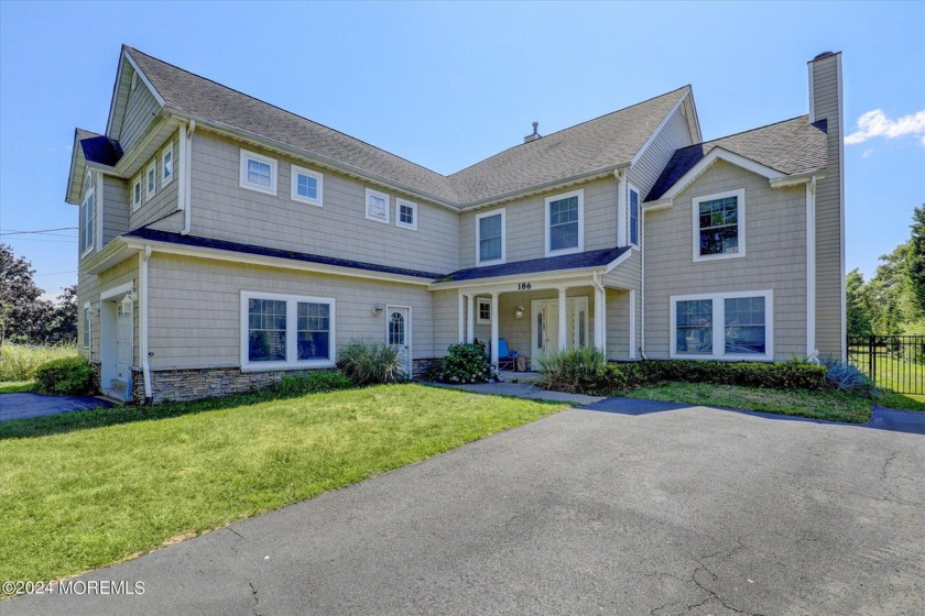 Beautifully updated colonial home on a huge lot overlooking a - Beach Home for sale in Oakhurst, New Jersey on Beachhouse.com