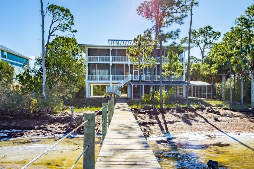 Authentic open porch-style living with a flare of old-Florida - Beach Home for sale in St. George Island, Florida on Beachhouse.com