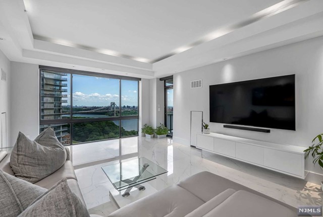 Welcome to this elegant PENTHOUSE in the sought after Luxury - Beach Condo for sale in Fort Lee, New Jersey on Beachhouse.com