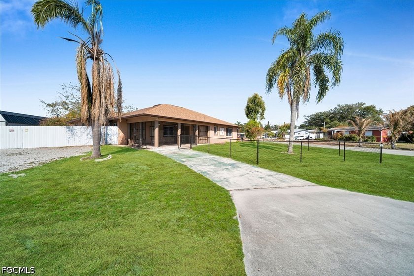 Spacious 2,071 sq ft single-family home featuring 5 bedrooms and - Beach Home for sale in Lehigh Acres, Florida on Beachhouse.com