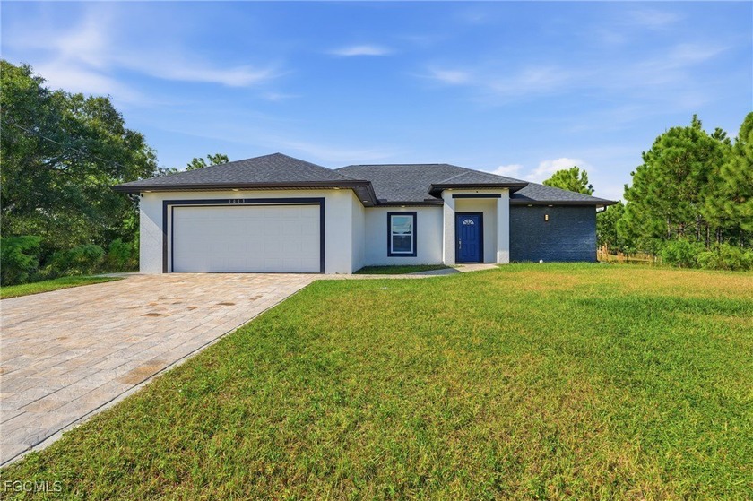 Take a look at this inviting 3-bedroom, 2-bath home tucked away - Beach Home for sale in Lehigh Acres, Florida on Beachhouse.com