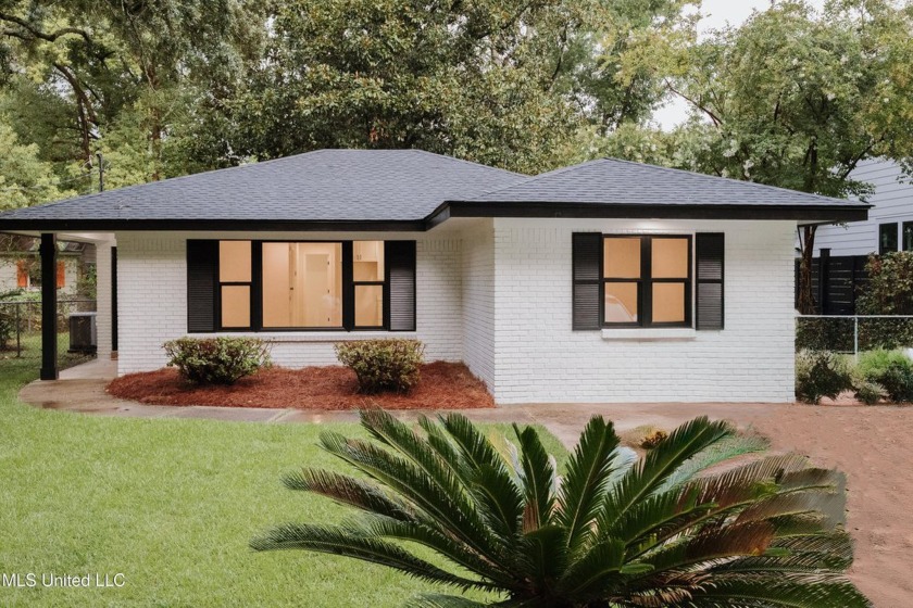 This fabulous Beach Haven is a perfect retreat for taking time - Beach Home for sale in Ocean Springs, Mississippi on Beachhouse.com