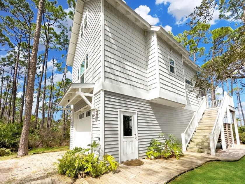 This lovely 1BR/1Bath bayfront cottage with a beautiful loft is - Beach Home for sale in Port St Joe, Florida on Beachhouse.com