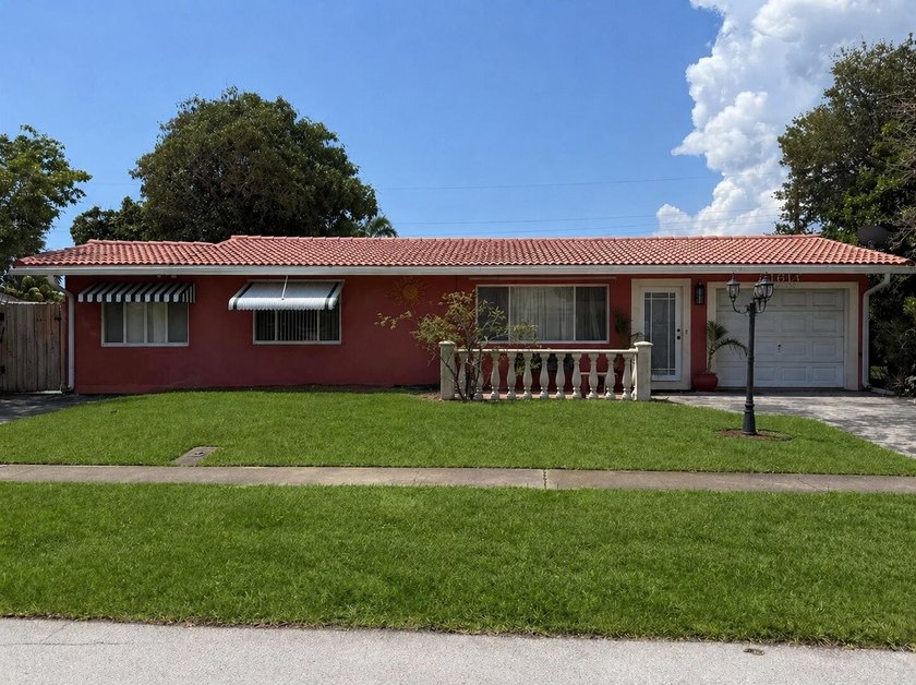 Experience the perfect blend of privacy and proximity in this - Beach Home for sale in Deerfield Beach, Florida on Beachhouse.com