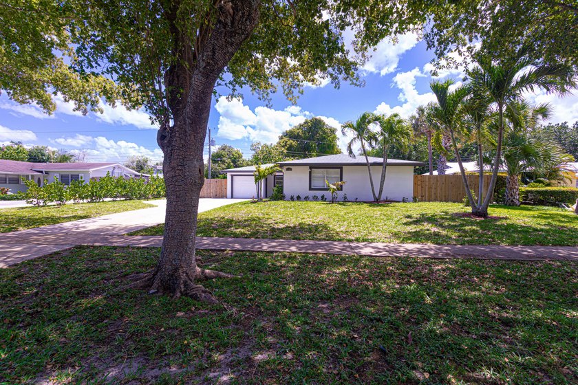 Fully Renovated Modern Oasis on over Half an Acre - No HOA! - Beach Home for sale in West Palm Beach, Florida on Beachhouse.com