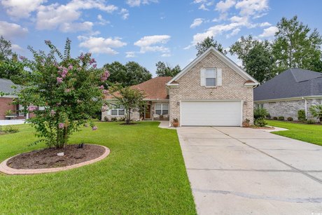 Welcome home to your all brick rancher nestled in the quaint - Beach Home for sale in Longs, South Carolina on Beachhouse.com