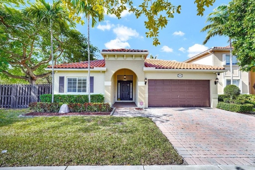 This charming single-story lakefront home offers an inviting - Beach Home for sale in Homestead, Florida on Beachhouse.com