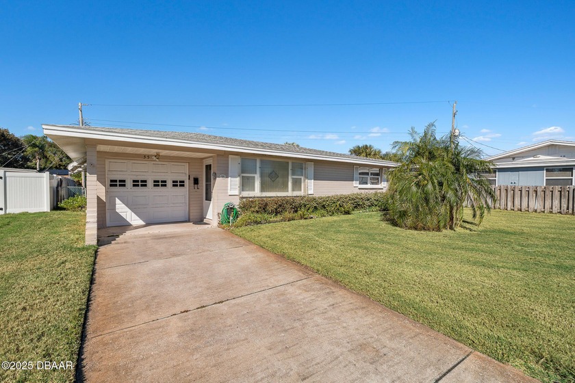 Welcome to this charming beachside bungalow, ideally situated - Beach Home for sale in Ormond Beach, Florida on Beachhouse.com