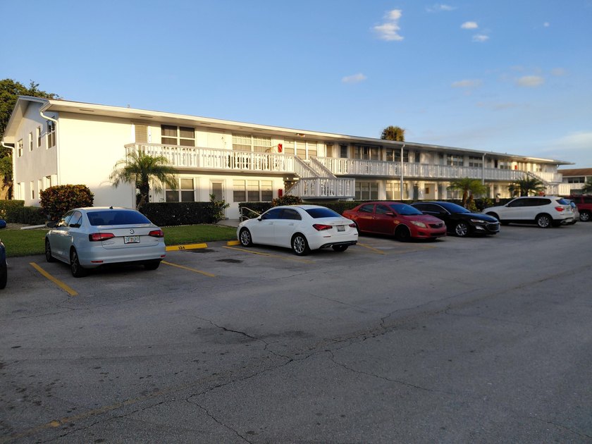 First-floor corner unit in a desirable gated 55+ community! - Beach Condo for sale in West Palm Beach, Florida on Beachhouse.com