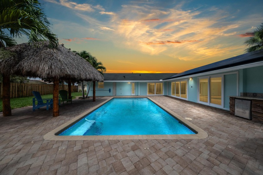 This beautiful 4 bedroom, 2 bath oasis Is truly a modern resort - Beach Home for sale in Melbourne Beach, Florida on Beachhouse.com