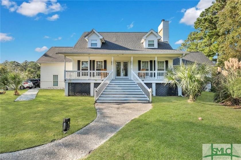 Experience the perfect blend of comfort and elegance in this - Beach Home for sale in Richmond Hill, Georgia on Beachhouse.com