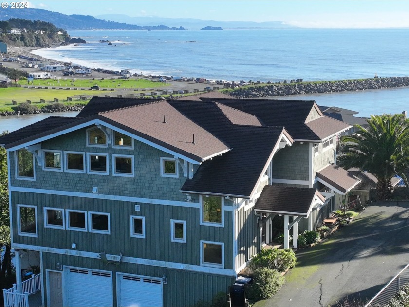 This stunning Chetco River waterfront home is a true masterpiece - Beach Home for sale in Brookings, Oregon on Beachhouse.com