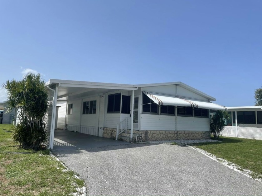 Welcome to Palm Lake Estates - a vibrant 55+ community! Own your - Beach Home for sale in Riviera Beach, Florida on Beachhouse.com