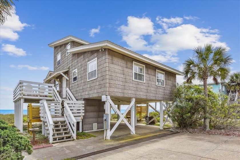 The Old Florida style beach home is located in the desirable - Beach Home for sale in St. George Island, Florida on Beachhouse.com