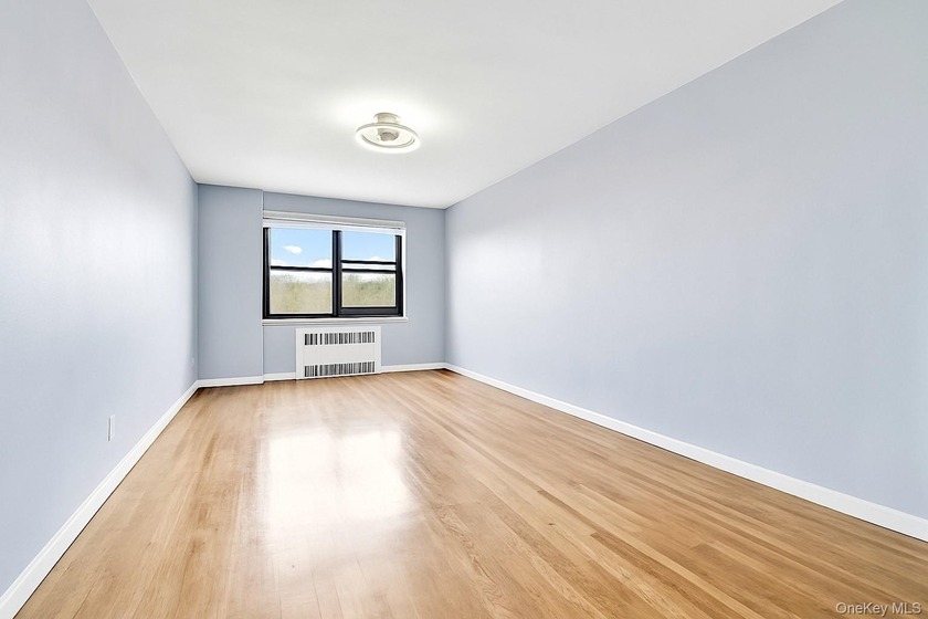 Spacious and sun-filled 2-Bedroom, 1-Bath Corner Co-op in the - Beach Home for sale in Flushing, New York on Beachhouse.com
