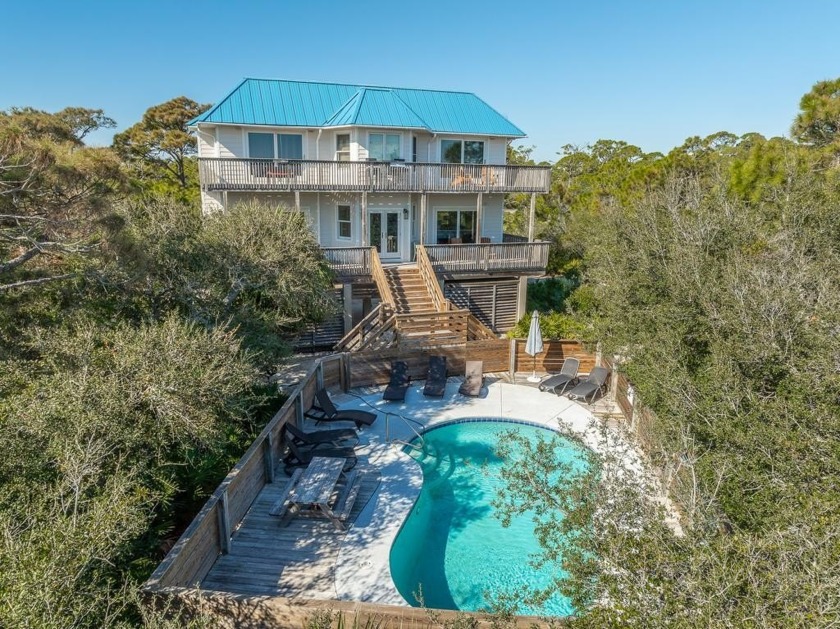 Welcome to Blue Haven!  A charming 3 bedroom 3 bath 1st Tier - Beach Home for sale in St. George Island, Florida on Beachhouse.com