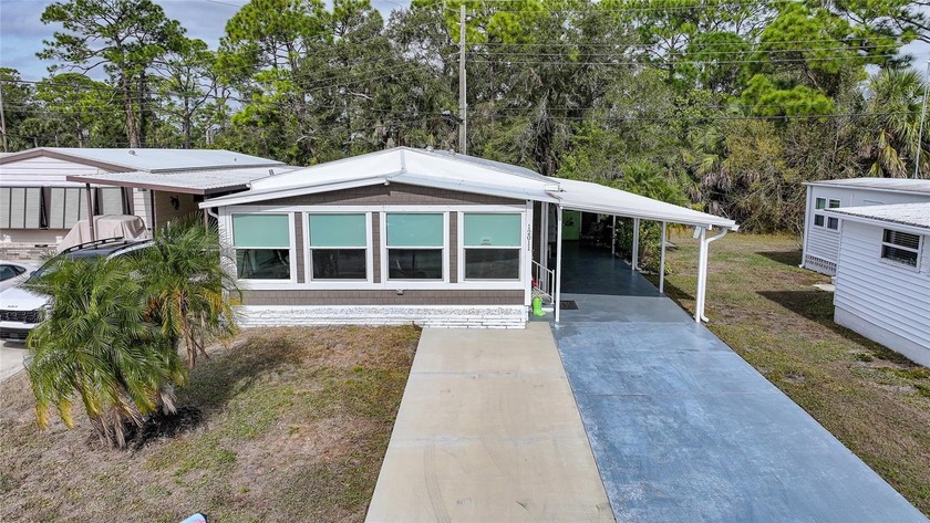 Honey, this is THE ONE! Fully remodeled and meticulously cared - Beach Home for sale in North Port, Florida on Beachhouse.com