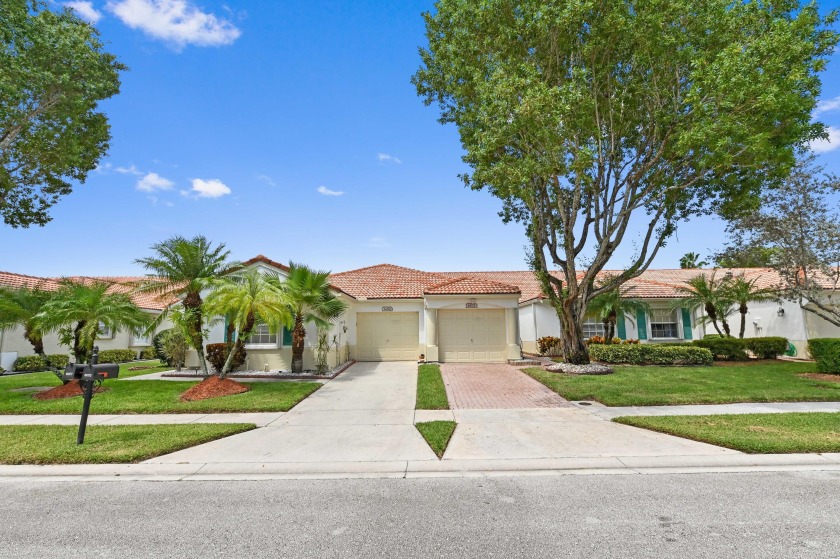 Presenting a meticulously preserved corner unit villa, located - Beach Home for sale in Delray Beach, Florida on Beachhouse.com