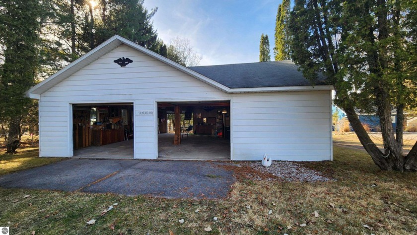 Torch Lake is the setting for this 36' x 36' garage with 12' x - Beach Lot for sale in Alden, Michigan on Beachhouse.com