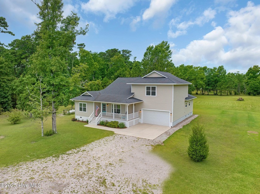 This waterfront, custom-built 3-bedroom, 3-bath home with a - Beach Home for sale in Gloucester, North Carolina on Beachhouse.com