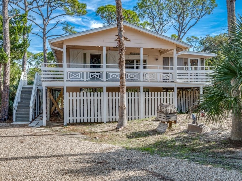 Blending vintage charm with modern updates, this beautifully - Beach Home for sale in St. George Island, Florida on Beachhouse.com