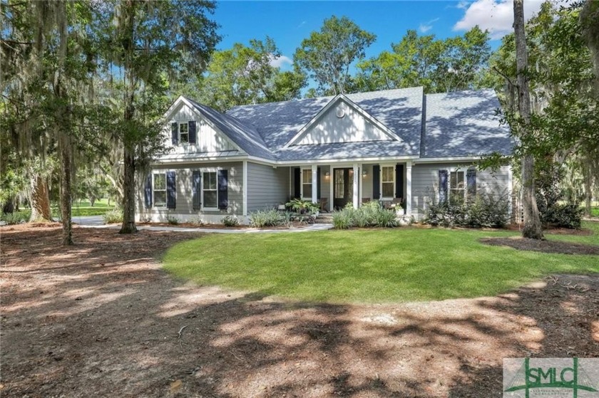 Welcome to your dream home nestled within a serene, gated - Beach Home for sale in Townsend, Georgia on Beachhouse.com